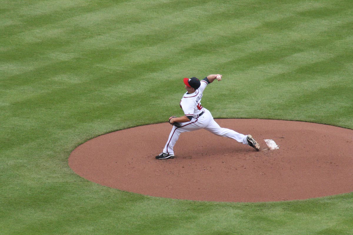 DON’T MEDDLE WITH MEDLEN! -- Braves pitcher Kris Medlen delivers a pitch in the top of the first inning Monday afternoon at Turner Field. Medlen struck out 12 Colorado batters by the end of his second complete game of the season. The Braves defeated the Rockies, 6-1 (caption by McKenzie Taylor and Patrick Wise).