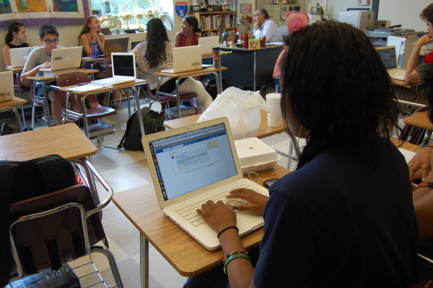 NEW MODO OF LEARNING: Debate coach Mario Herrera has his students use Edmodo to complete work in a  Speech/ Forensics class. 