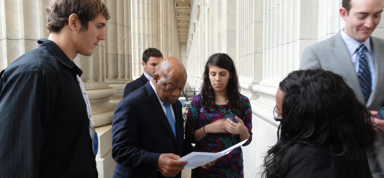 FISHING FOR OPPORTUNITY: Ted Galanos (left), Annie Mason (center) and Lauryn Taylor(right) meet with U.S. Rep. John Lewis in Washington, D.C. to discuss their overfishing project. Mason said that Lewis was impressed and thought the students had good ideas.