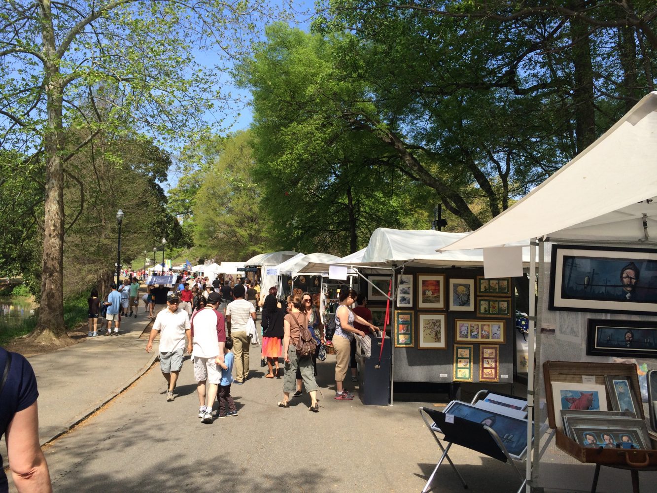 The sidewalks of Piedmont Park packed with artist booths.