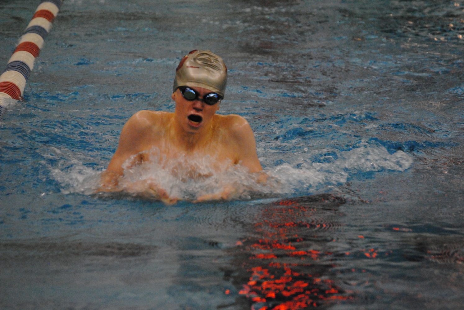 Junior Justin Cucchi qualifies for state in the 100-yard breaststroke. 