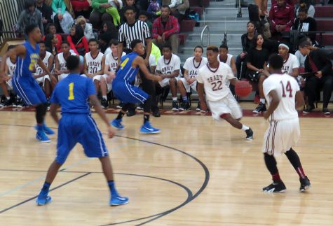 Boys basketball suffers first-round playoff exit