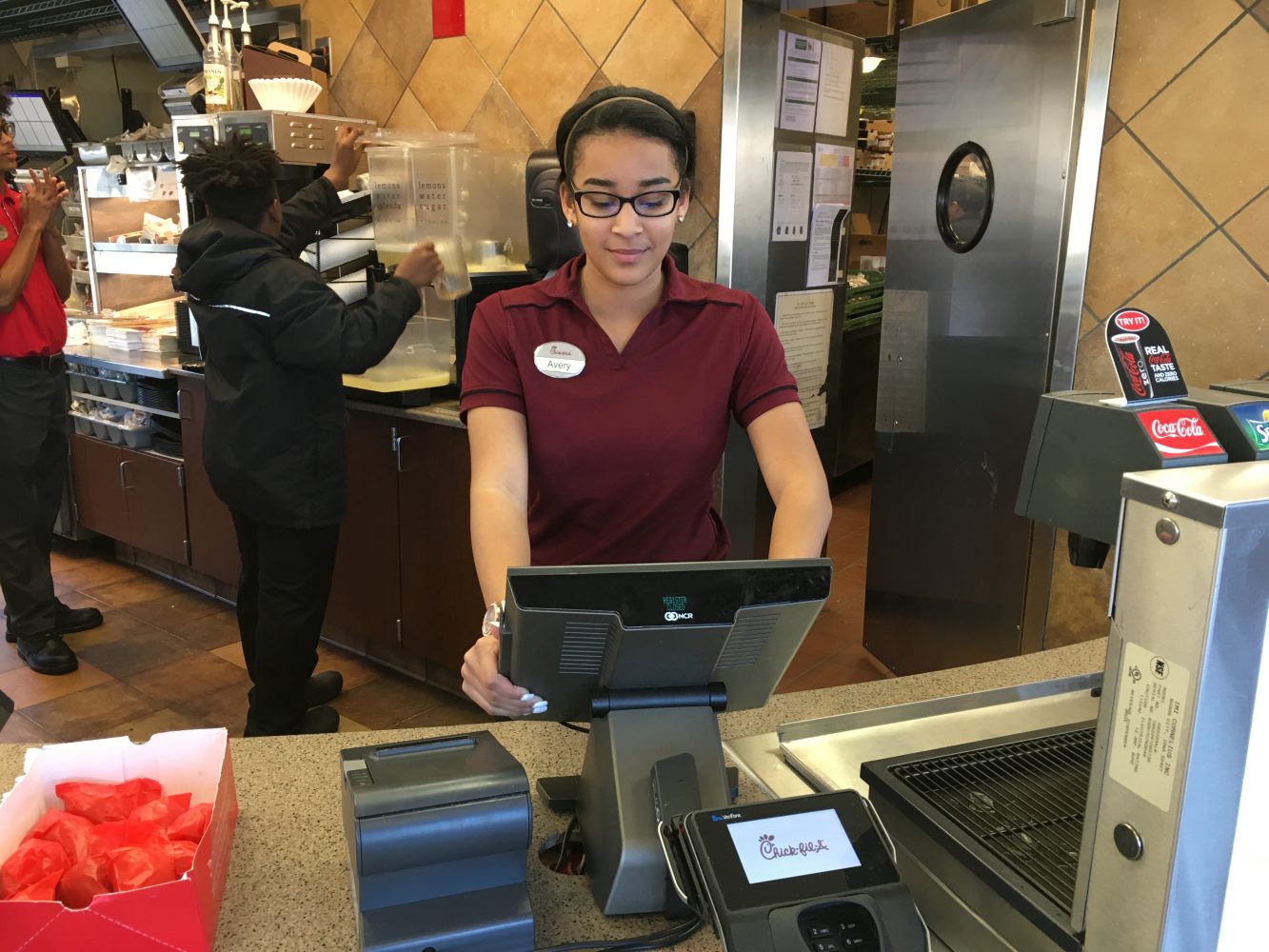 Freshman Avery Alford works the counter at Chik-fil-A. Alford has noticed that as a result of her job, it’s more difficult to balance her schoolwork with her social life and extracurriculars. 