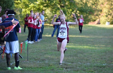 Senior Gracie Griffith takes first place at the 2015 APS Cross Country Championship on Oct. 14. During her high school career, she has participated in varsity cross country, soccer, and basketball. She has recently entered various longs distance running events, including 10ks and half marathons. 