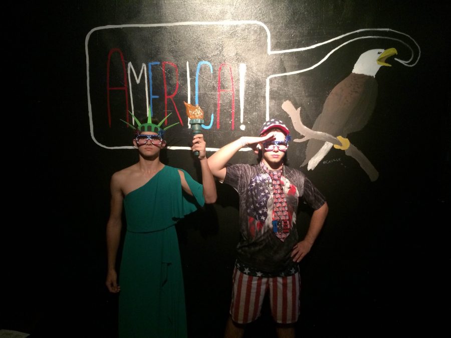 Coffeehouse hosts Dhruv Mehra (left) and Ben Grady (right) personify two hyper-patriotic Americans at Red, White and Brew: An All American Coffeehouse.