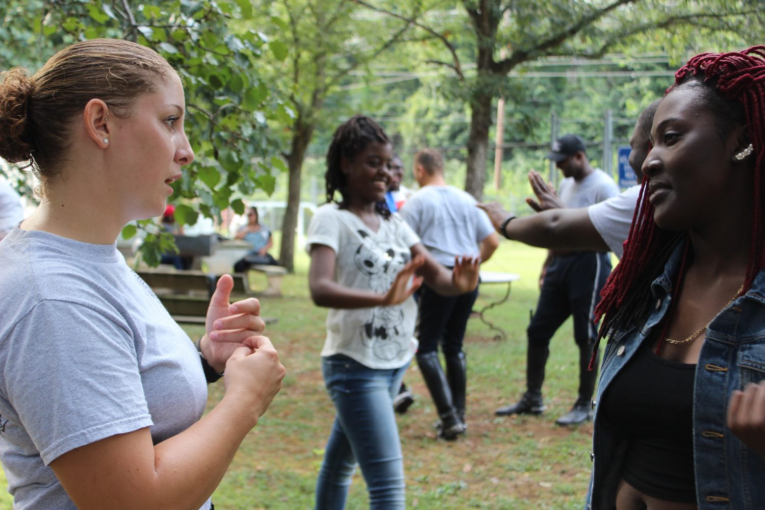 In a regular Atlanta Police Foundation meeting, Aug. 31, mounted police officers and their mentorees split into small groups to do trust falls. During this time, groups have time  to bond and catch up.