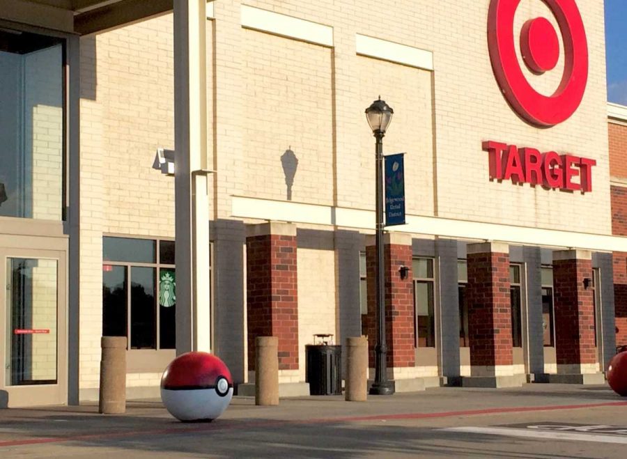 Edgewood Target promotes Pokémon GO by painting Pokéballs in front of the store.