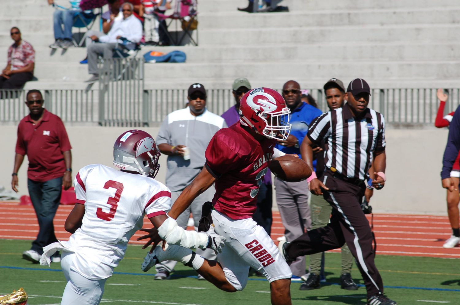 Senior quarterback Caylin Newton runs into the end zone for a 5-yard touchdown.