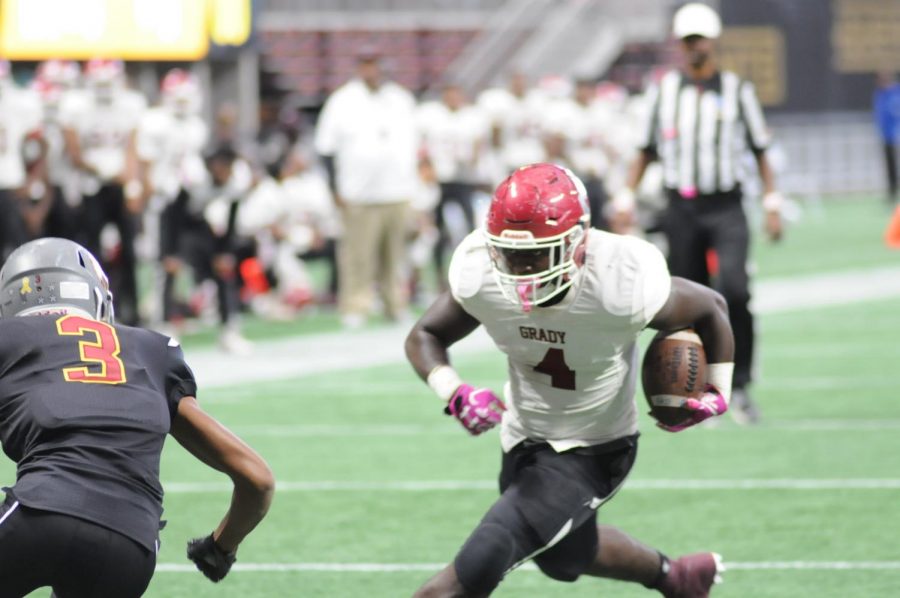 Knights tailback Craig Philpot looks for running room early in a game at Mercedes Benz Stadium on Oct. 21. Maynard Jackson won the contest 45-7.