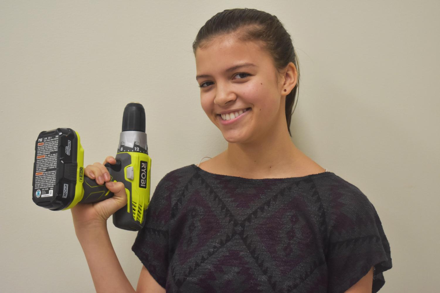 Bradley Colburn-Stanger used a drill to fix most of the broke girls bathroom stalls by herself after noticing frustration caused by their disrepair.