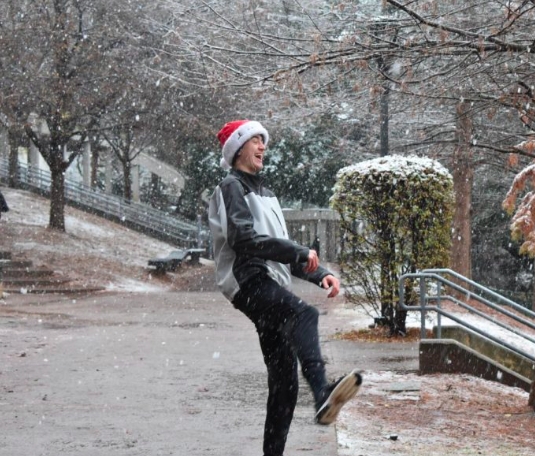 Sophomore Jack Palaian plays in the snow on Dec. 8th. Grady released early due to the weather conditions on this day.