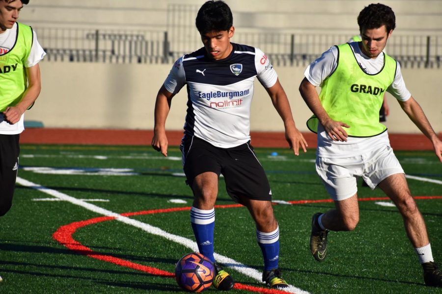 Garcia brings his love of soccer from Ecuador all the way to practice on the Grady field.