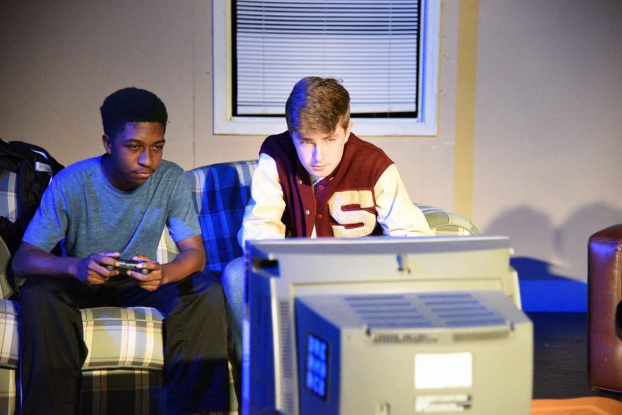 POWERFUL STATEMENTS: Juniors Maximus Freightman (left) and Harrison Briggs (right) in "Some Other Kid," a play imagining the moments before 17-year-old Trayvon Martin was killed by a neighborhood watch captain in 2012. Senior Niya Taylor directed the one act play, which was written by A. Rey Pamatmat.