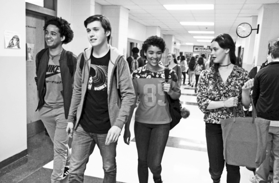 IM COMING OUT: Shot at Gray, this scene shows Simon Spier (Nick Robinson) navigating the hallway with his friends, portrayed by (from left), Jorge Lendenborg Jr., Alexandra Shipp, and Katherine Langford