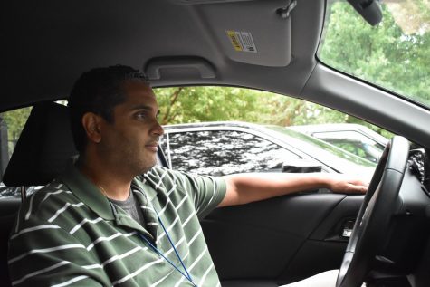 School Business Manager Byron Barnes studies the traffic patterns during his commute home from Grady High School.