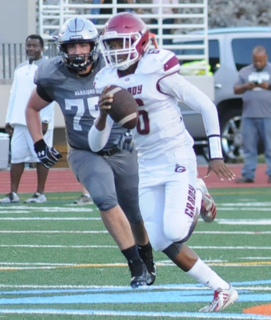 Quarterback Alvin James runs from a North Atlanta defender on a first down attempt on August 18th, 2018.