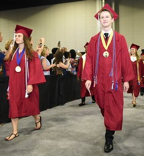 Left: Class of 2018 Valedictorian Hannah Prausnitz-Weinbaum and Right: Salutatorian Robert Weimar lead graduation procession.