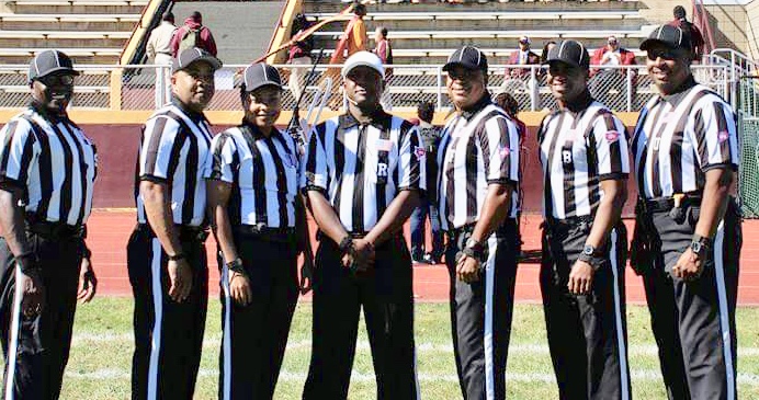 STANDING PROUD: From left to right is Kenny Grigsby, Jonathan Carter, Henrietta Powell,
Harlan Johnson, Ben Cole, David Boone and Kevin Sutton. Boone s entering his ninth year as a referee