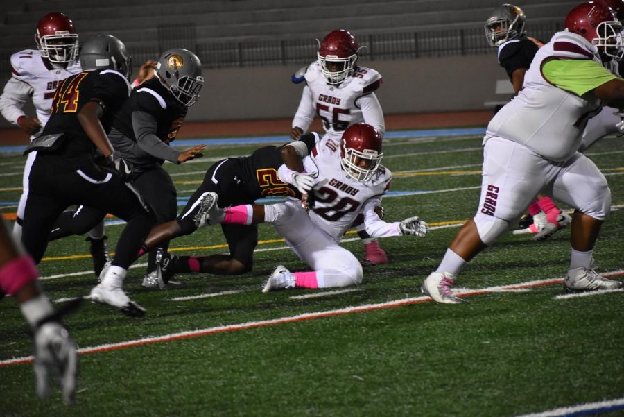 Grady senior running back Barry Wright fumbles the ball toward the end of the first half. The Knights fell 27-6.
