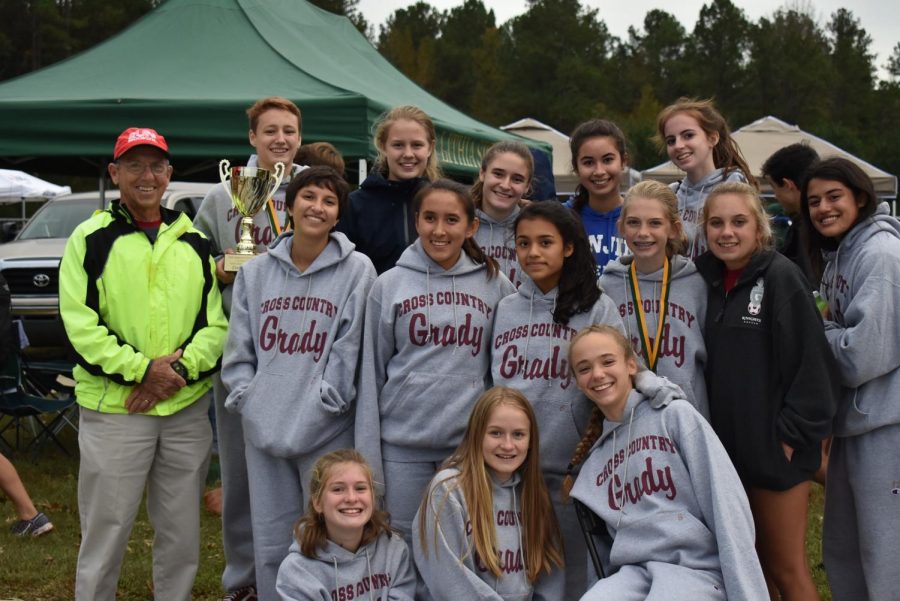 The girls team finished first overall at region. They were led by senior runner Anna Tischer.