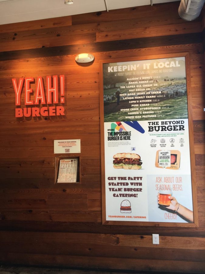 Walking through the front doors of Yeah! Burger in the Virginia Highlands, a poster advertising the Impossible Burger broadcasts its existence on the menu.