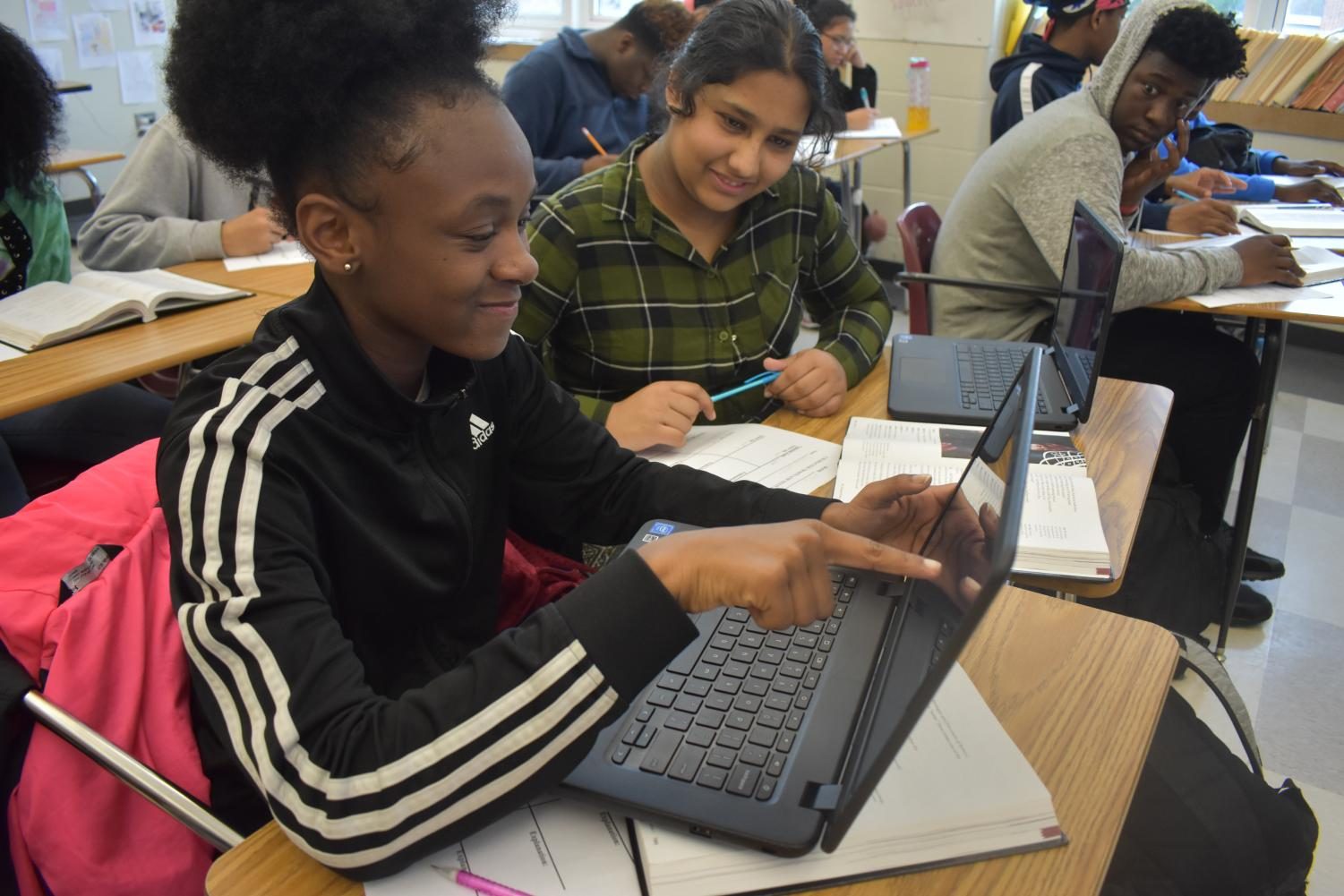 Students in Brooke Rameys 10th grade world literature class take advantage of the new touchscreen laptops purchased with donations by the Grady foundation to aid in learning the curriculum. The foundation plans to purchase nine more laptop carts soon. 