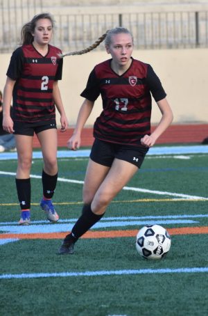 Senior and captain Lena Brown takes her space in the center of the field against North Atlanta. The girls team plays next on Friday, Feb. 8 against Columbus.