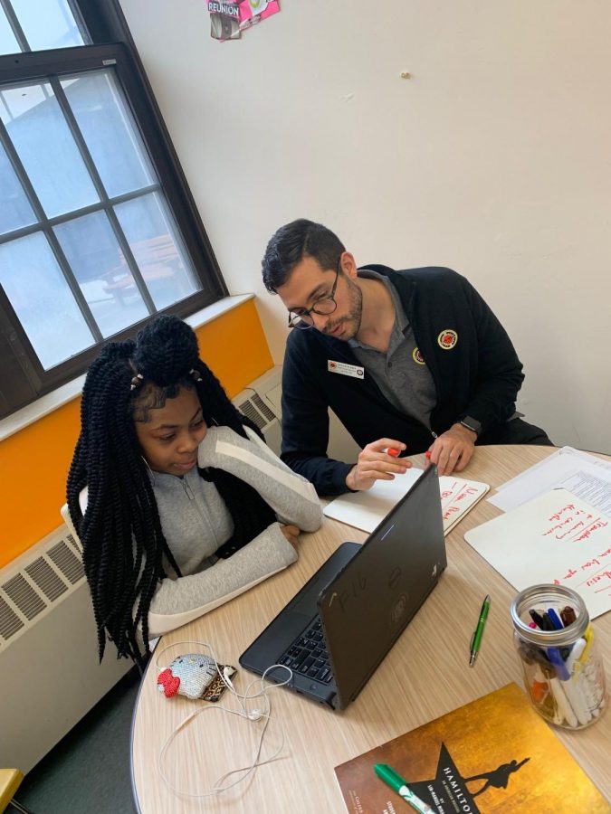 STRIVE FOR SUCCESS: Grady alum Shaun Kleber works with one of his students in Detroit for City Year. Kleber hopes to use this to jump-start his career into education.