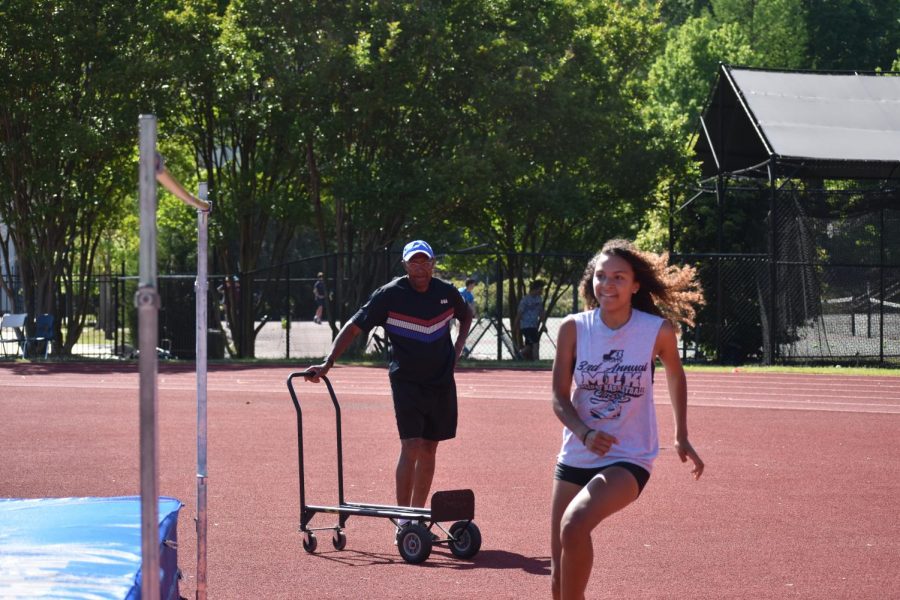Quinaliza coaches jumping, including the high jump, triple jump and long jump, for the track & field team.
