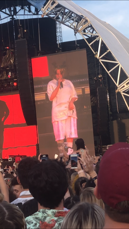 Billie Eilish took her common approach of big and baggy clothes, but she took notes from last year and made sure to wear lightly colored clothes. Shorts were a must. Billie is a common fashion inspiration, and often sports custom luxury branded clothes like this.