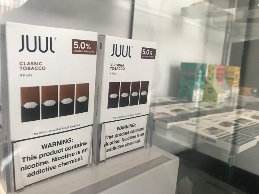 Juul+pods+are+sold+in+flavors+like+mint%2C+mango%2C+tobacco+and+menthol.+Each+colorful+pod+contains+as+much+nicotine+as+a+pack+of+cigarettes.+