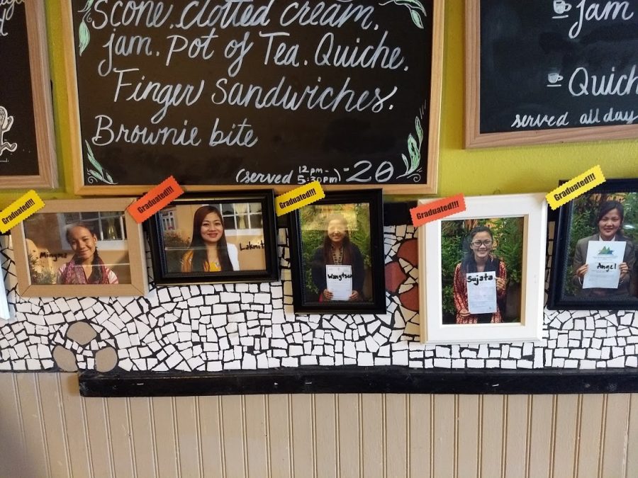 Dr. Bombays tea house in Candler Park displays pictures of women who graduated college with the help of the Learning Tea, a project the tea house helps fund.