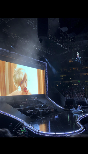 Dedicating his song to Marilyn Monroe, Elton John played Candle in the Wind with photos of her in the background.