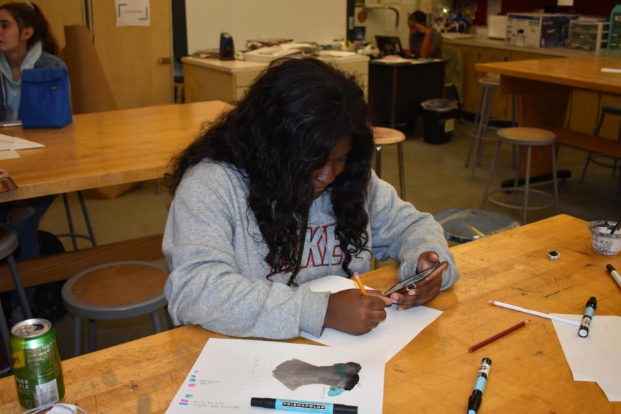 Sophomore Jayla Davis works on her design for a corset in Valerie Williams Costume Tech class. The class is working on corsets as a study in clothing items specific to historical timelines. 
