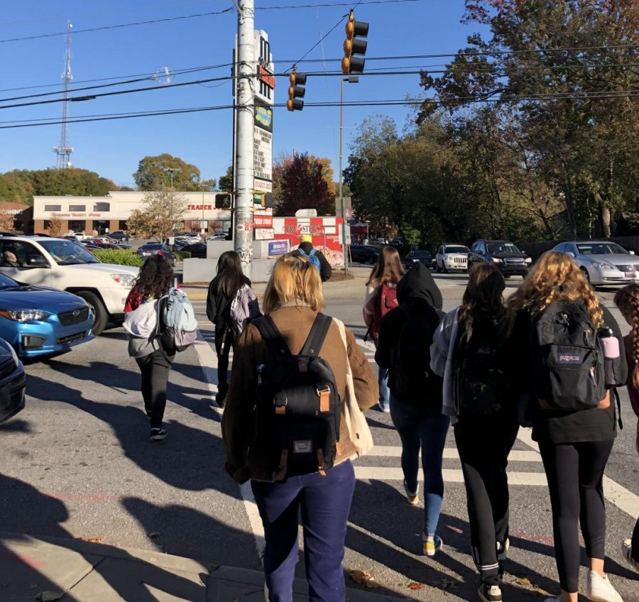 Students+cross+busy+intersection+after+school+at+the+corner+of+8th+Street+and+Monroe+Drive.