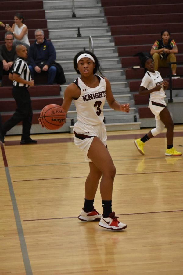 Jaliyah+Lett+scans+the+court+in+transition+in+a+49-33+loss+against+Paideia+on+Nov.+8.