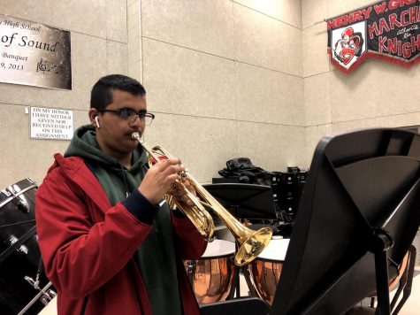 PRACTICE MAKES PERFECT: Trumpeter Bhuvan Saraswat practices “Shenandoah”, one of the band’s pieces for their LGPE, or large group performance evaluation. The band’s LGPE is March 11th.