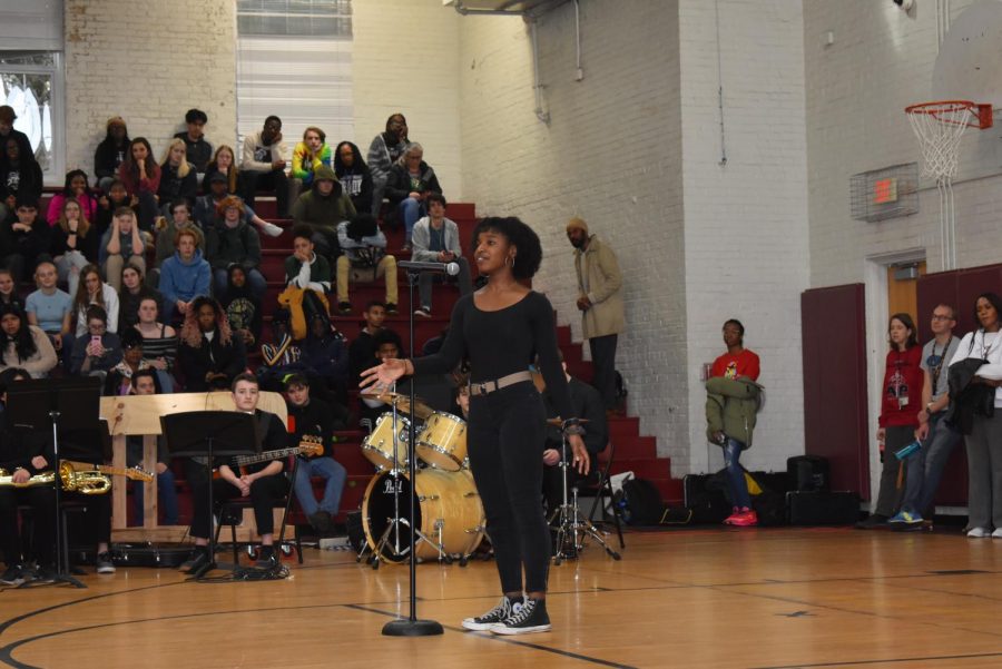Junior Erin Taylor performs a spoken word entitled This is America to raise awareness for the violence that African Americans face. 