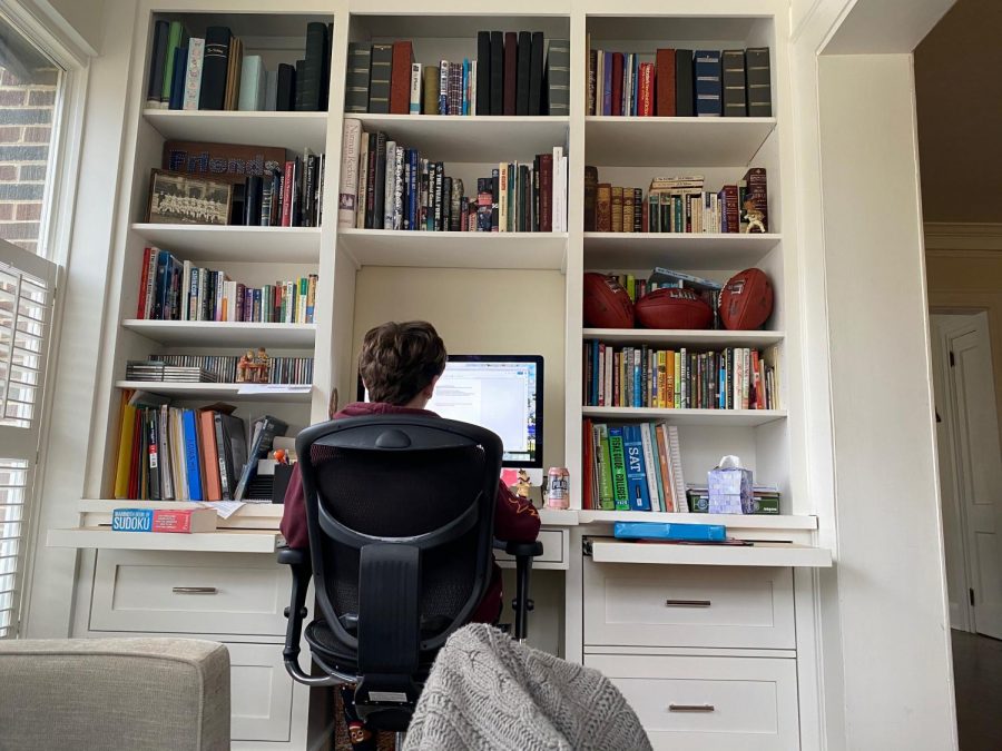 Freshman Brian Edwards works from home during the COVID-19 outbreak. Recent announcements regarding school closures through the end of the 2019-2020 school year have left students grappling with the extended reality of online school. 