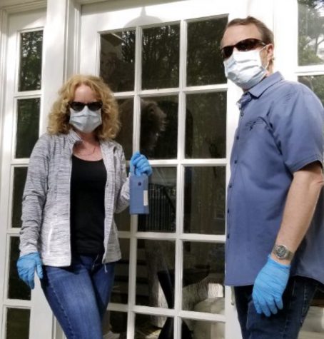 Real estate agents and Grady parents Lee and Darlene Gillespy take proper safety precautions when showing houses. 