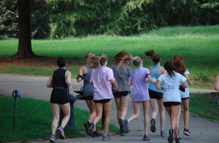 The girls cross country team runs through Piedmont park to prepare for their meets to come.
