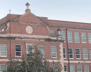 The Atlanta Board of Education voted to finalize Midtown High School as the new name for Henry W. Grady High School. 