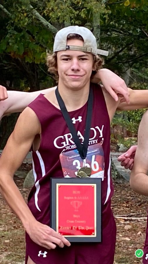 Everett after winning the region championships in cross country this season.