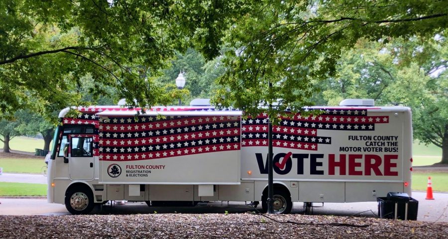 One of the two new Fulton County mobile voting units parked in Piedmont Park on October 27. Social-distancing markers lined the sidewalk and 