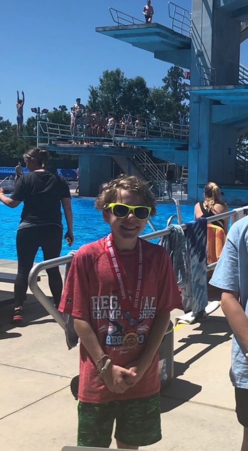 Freshman McCoy Lyman is shown here after placing in the 2019 USA Diving Junior Region 3 Championships.