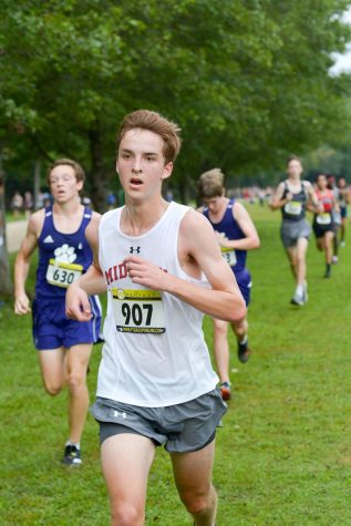 Senior Marcus Johnson runs at the Bob Blastow Early Bird Invitational Meet on Aug. 28. Johnson finished with a time of 18:04 and the team placed 13th.