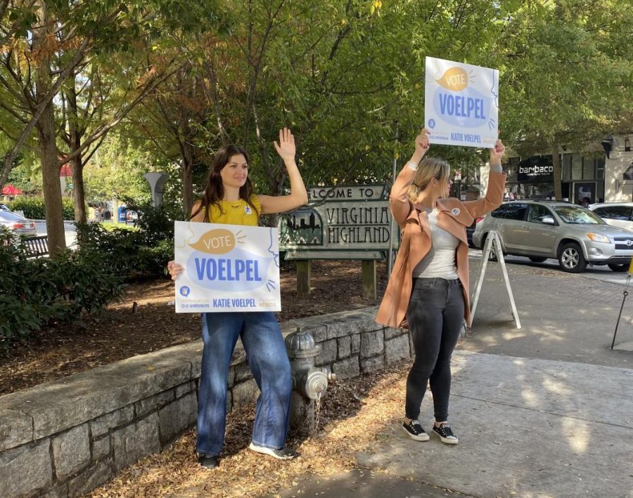 City Council District 6 candidate Katie Voelpel (left) and volunteer Melissa Shaughnessy (right) campaign together in Virginia Highland.  