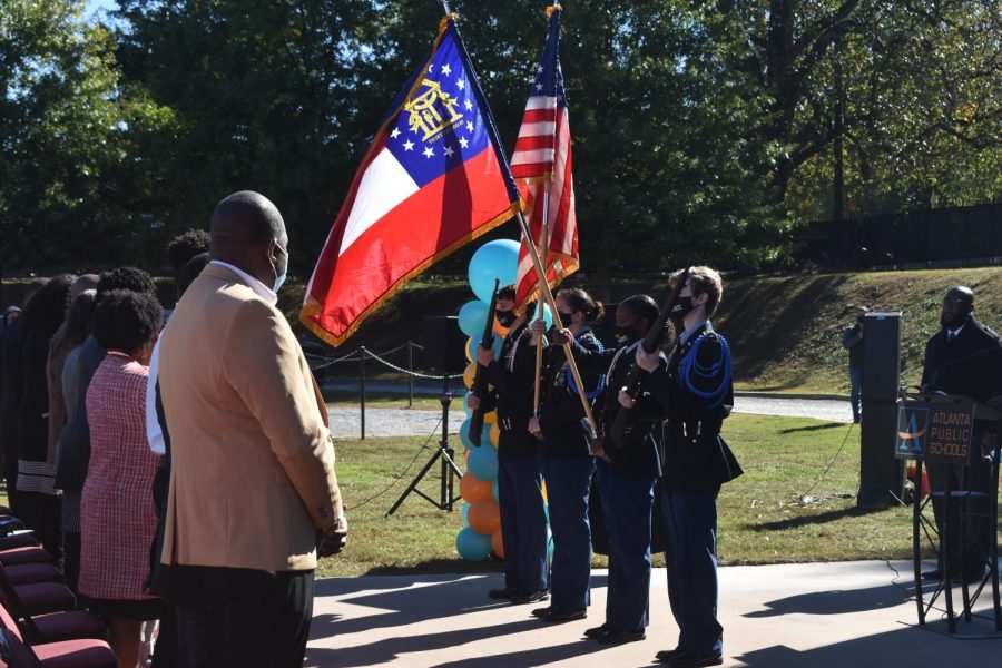 Midtowns JROTC performs the Presentation of Colors, for the Eddie S. Henderson Sr. Stadium renaming ceremony, led by senior Nola Pickering. 