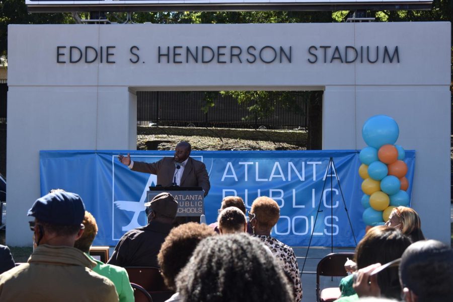 APS Athletic Director, Jasper Jewell commemorates Henderson with a speech summarizing his accomplishments. 
