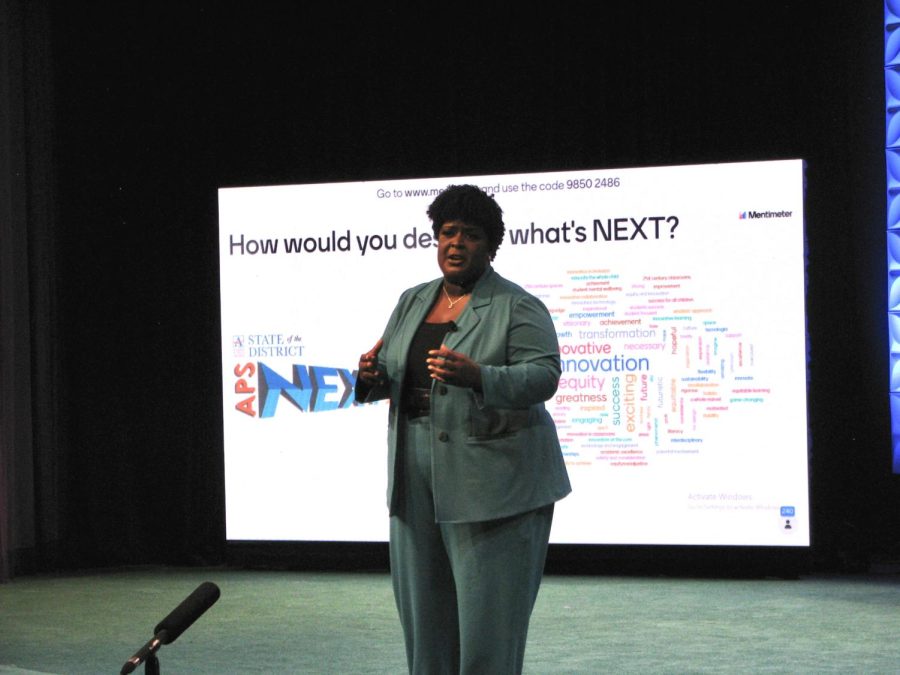 APS Superintendent Dr. Lisa Herring presents words provided by audience members, describing the audiences general feelings towards the future of APS. Some of the most popular words from the audience include innovation, equity and greatness. 